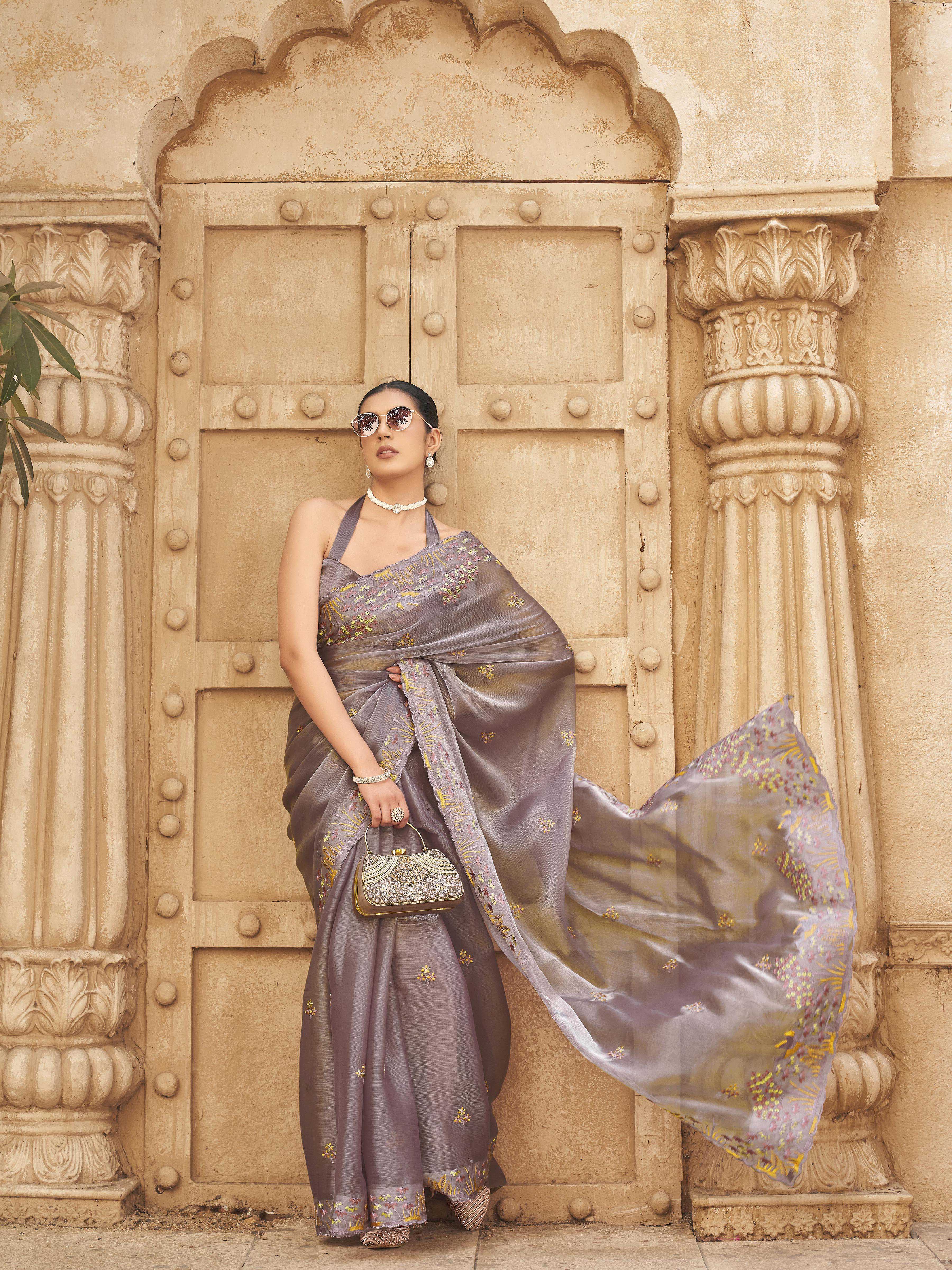 Mauve colored embroidered satin saree