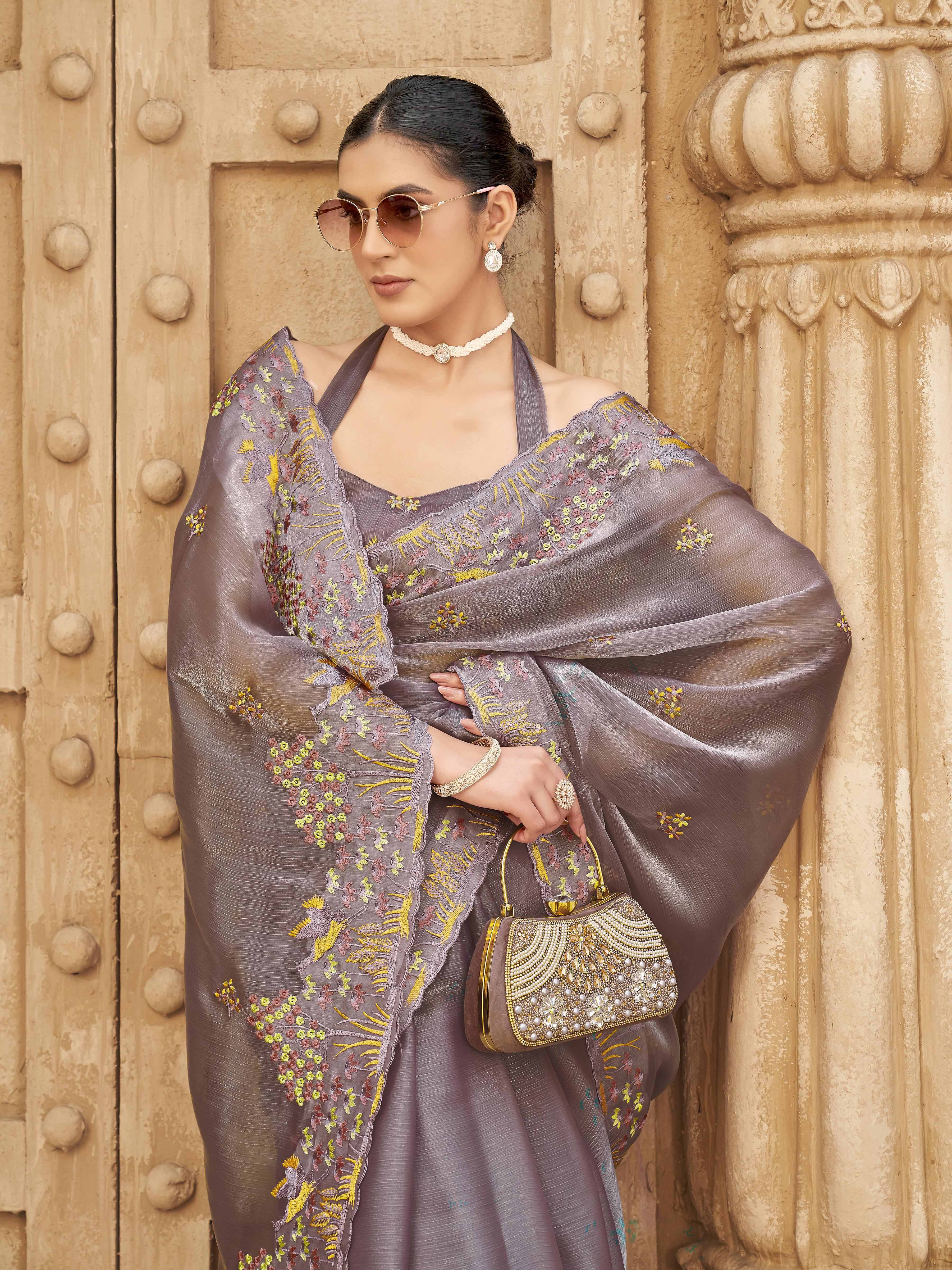 Mauve colored embroidered satin saree