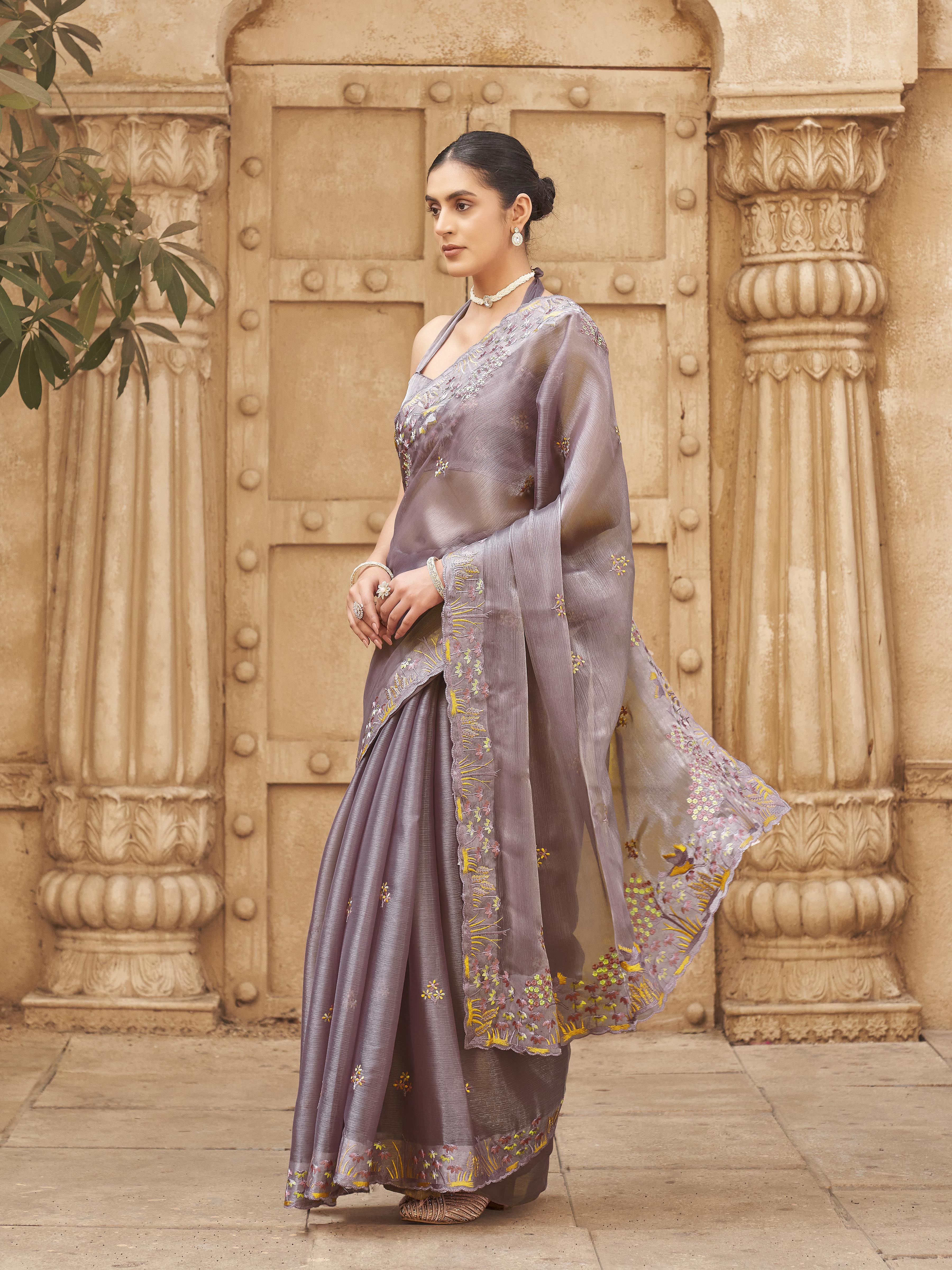 Mauve colored embroidered satin saree