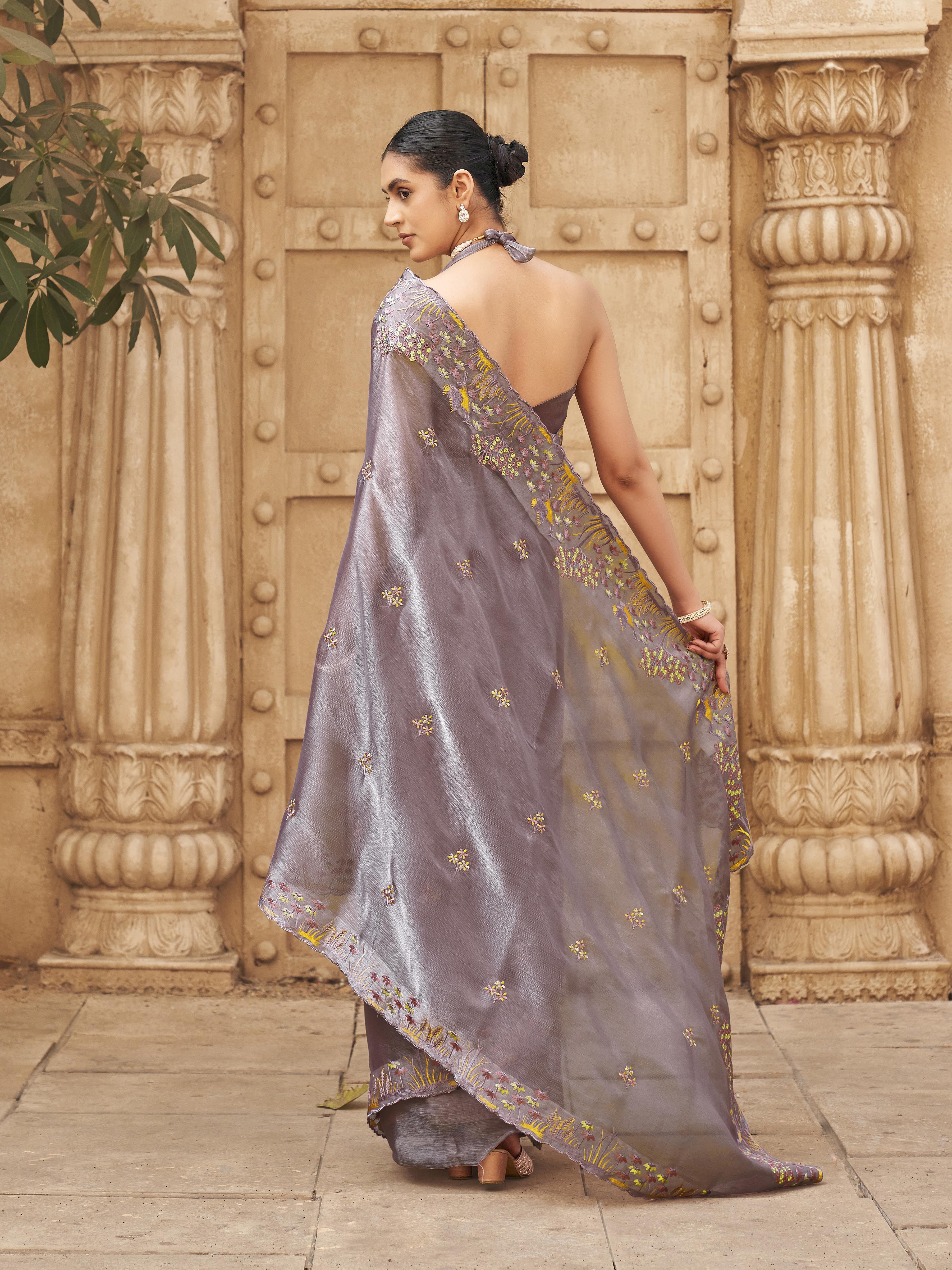 Mauve colored embroidered satin saree