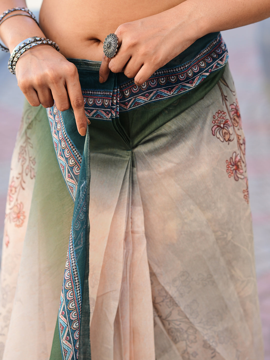 Ready to wear beige colored animal print poly cotton saree