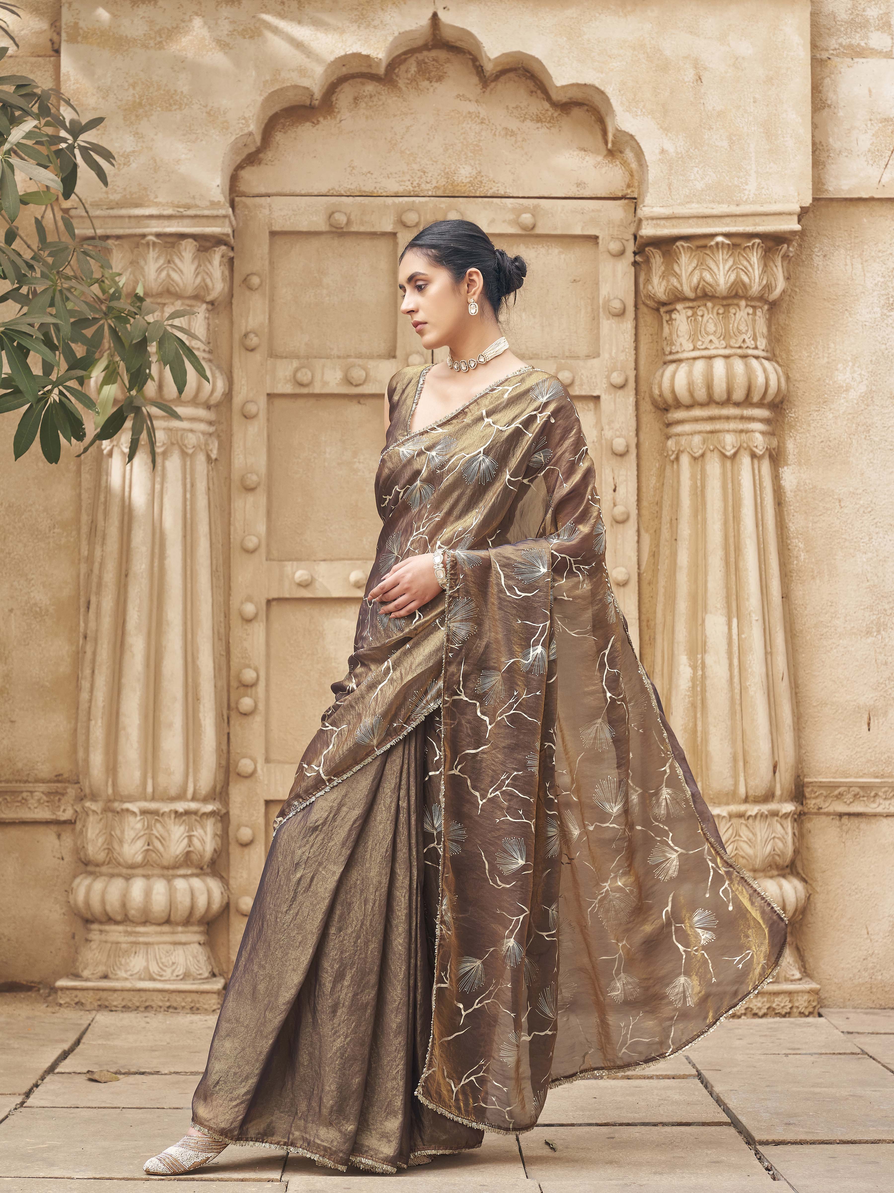 Ready to wear two toned gold and blue colored half and half foil embellished saree