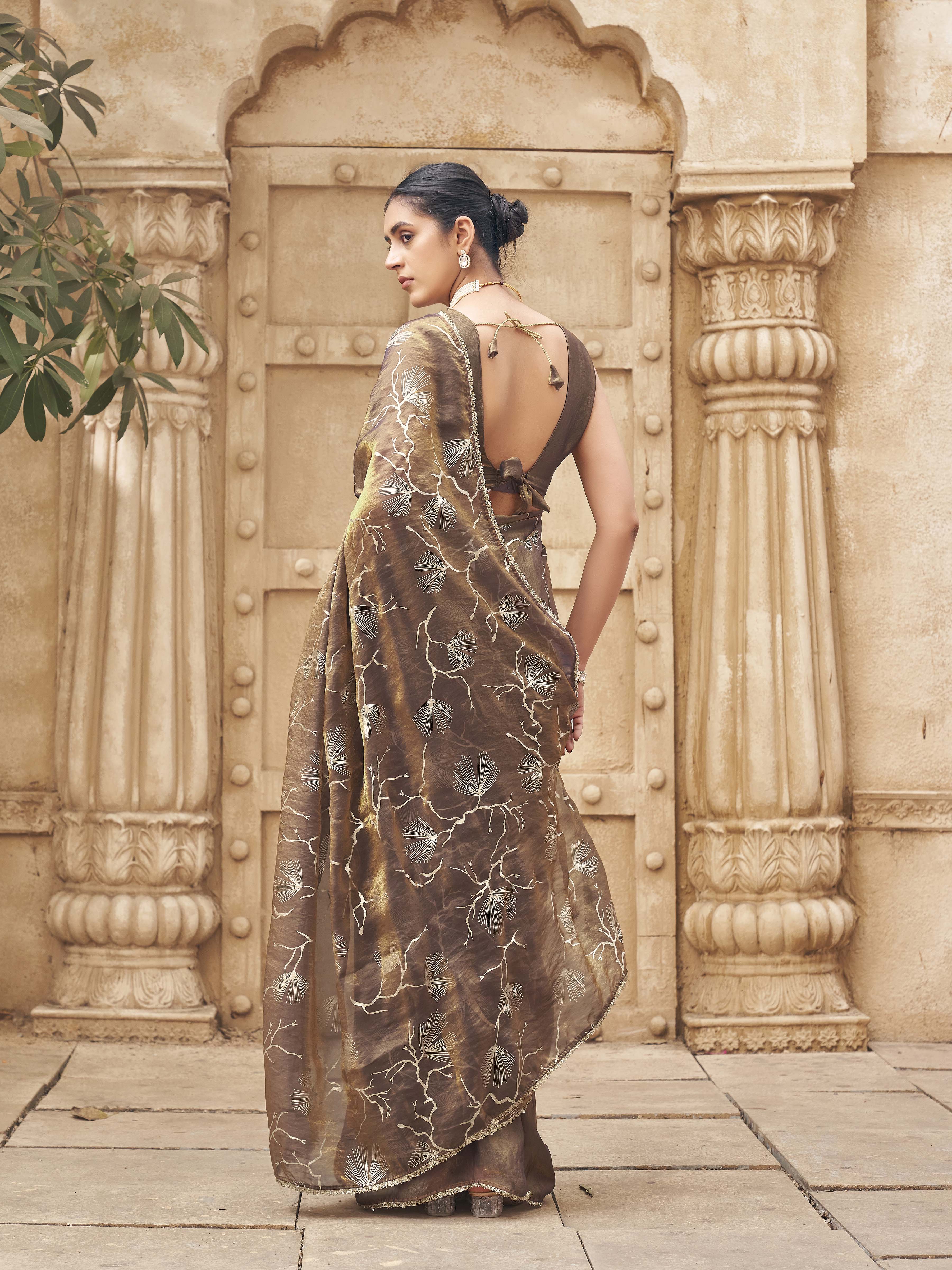 Ready to wear two toned gold and blue colored half and half foil embellished saree