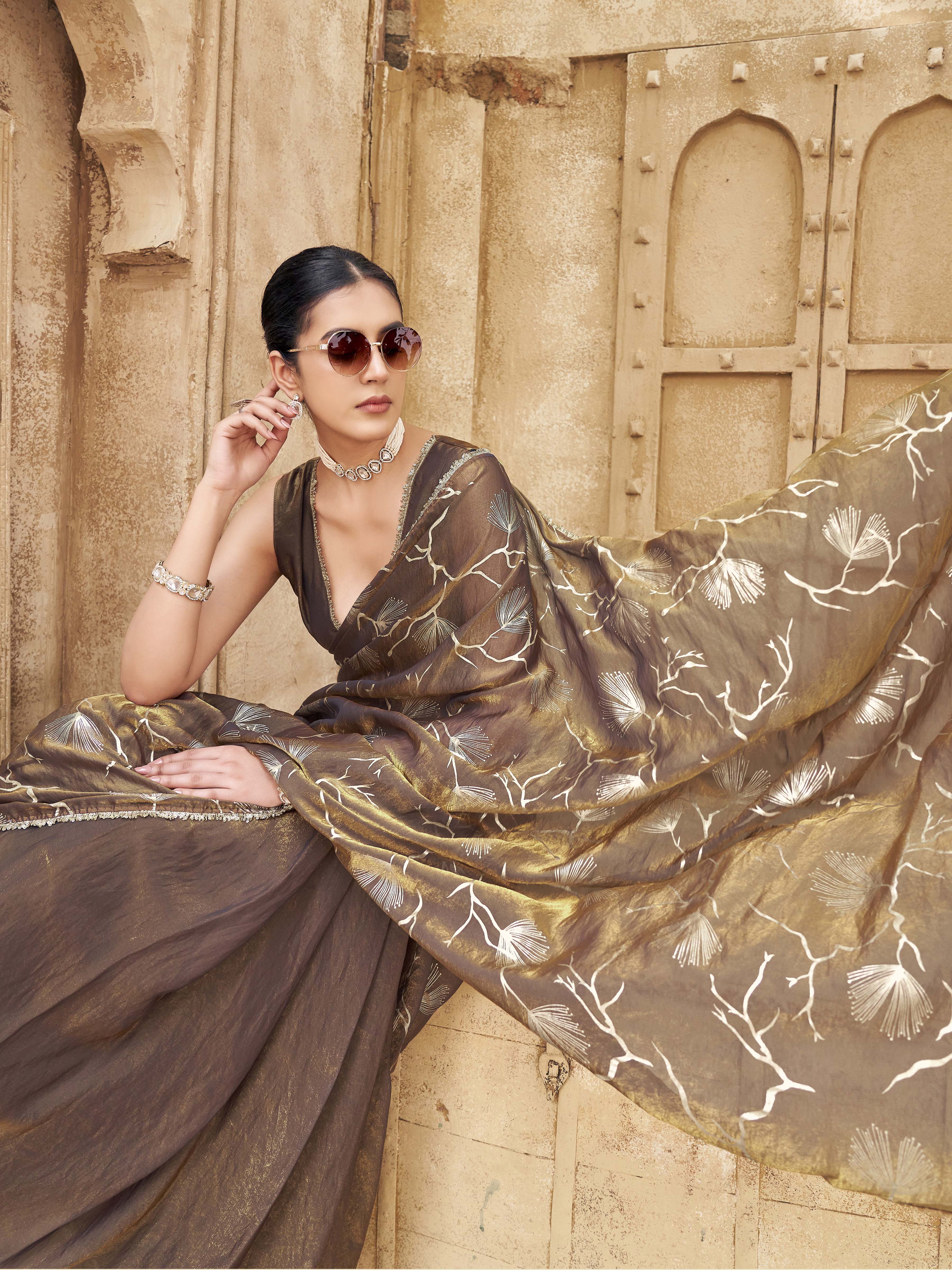 Ready to wear two toned gold and blue colored half and half foil embellished saree
