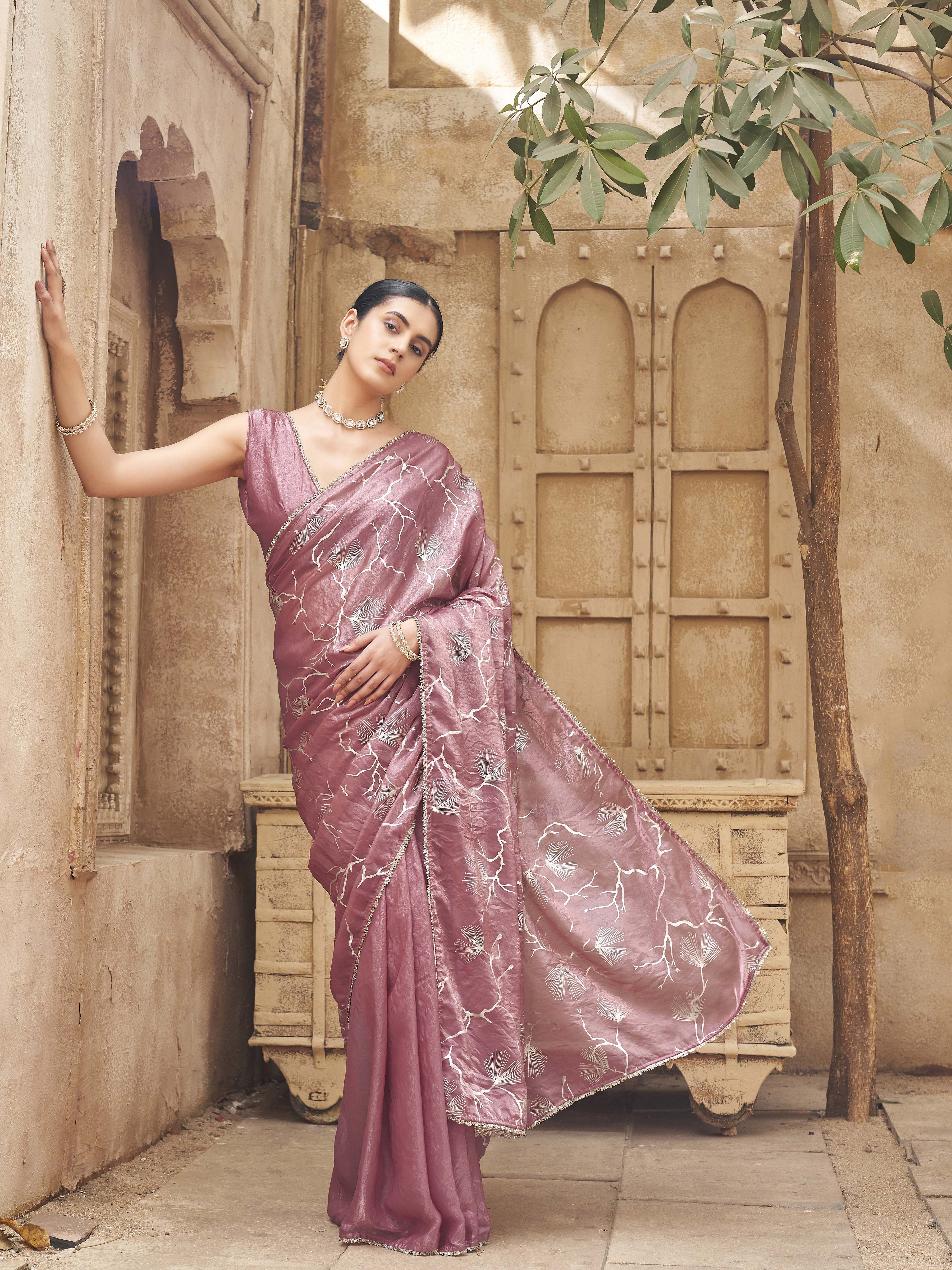 Ready to wear two toned pink and gold colored half and half foil embellished saree