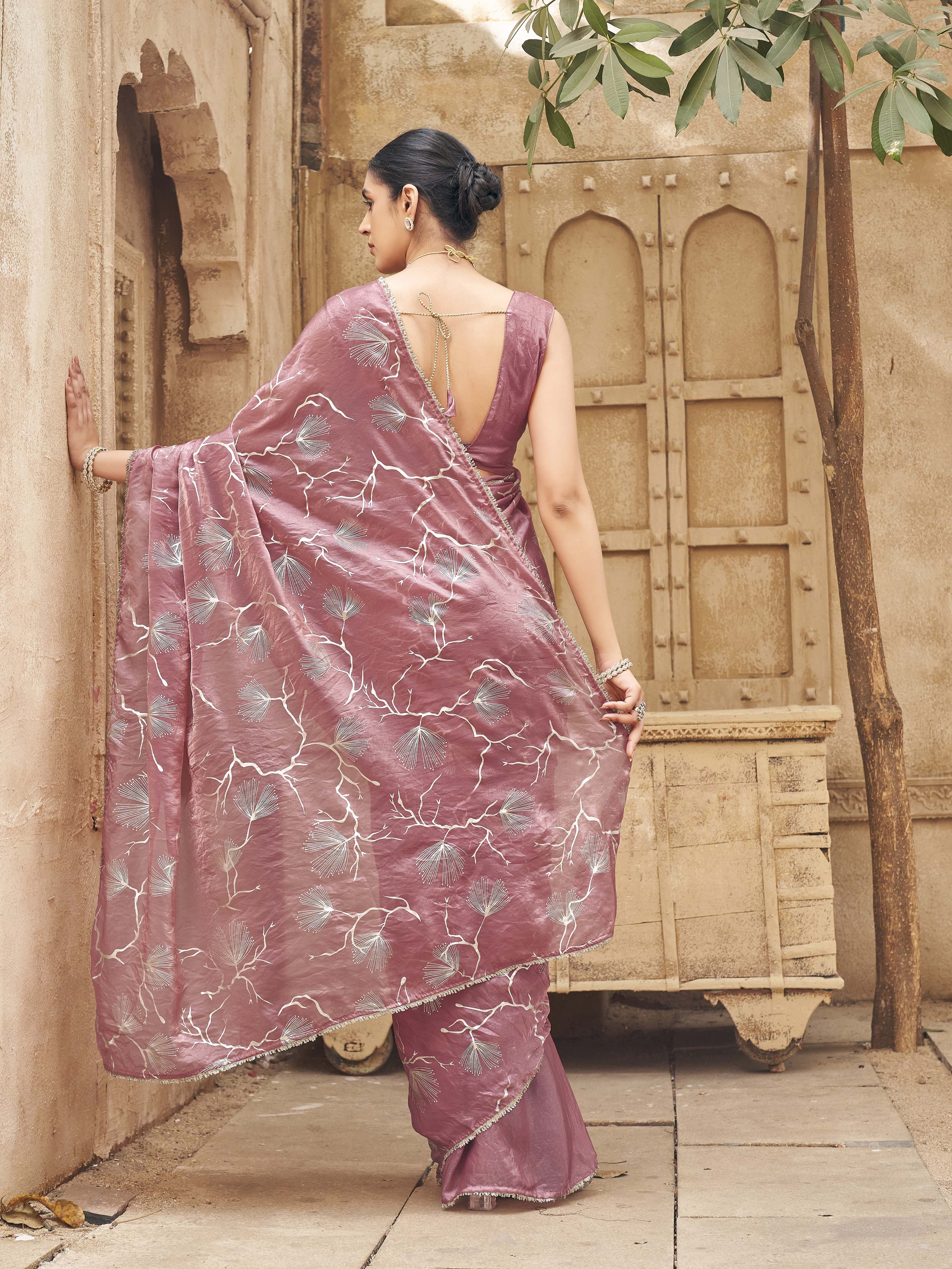 Ready to wear two toned pink and gold colored half and half foil embellished saree