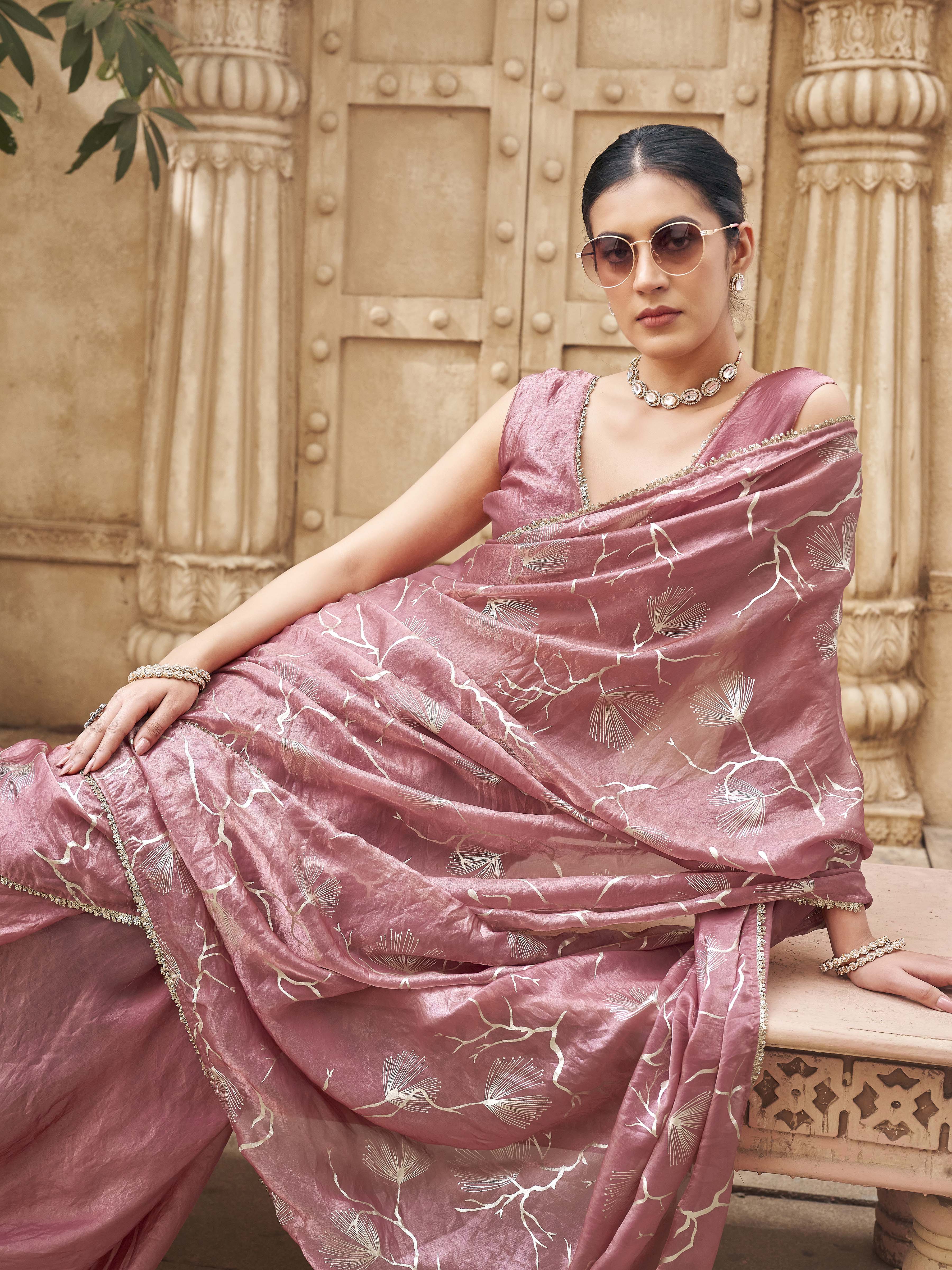 Ready to wear two toned pink and gold colored half and half foil embellished saree
