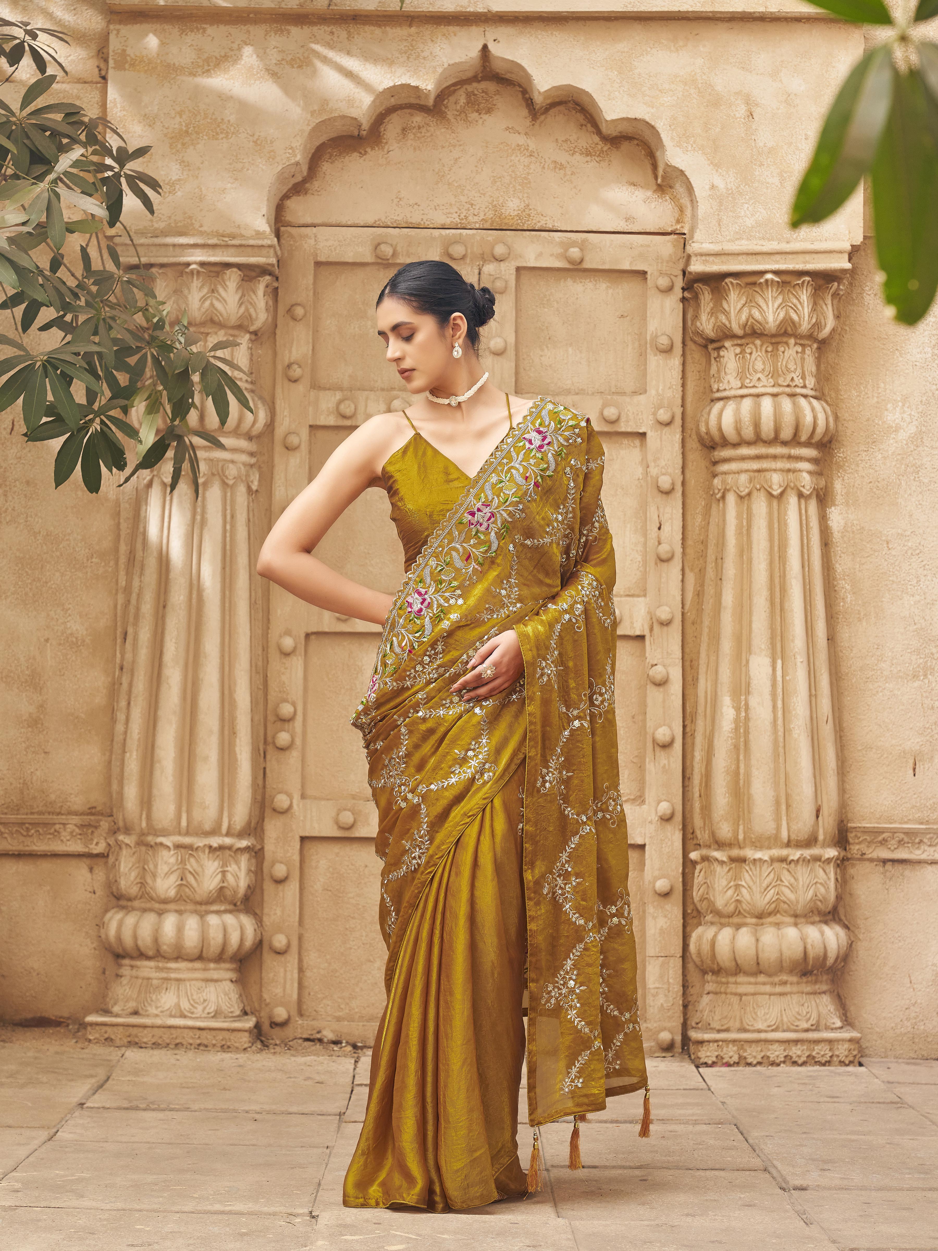 Two tone yellow and gold colored satin designer saree with sequin embroidery on pallu