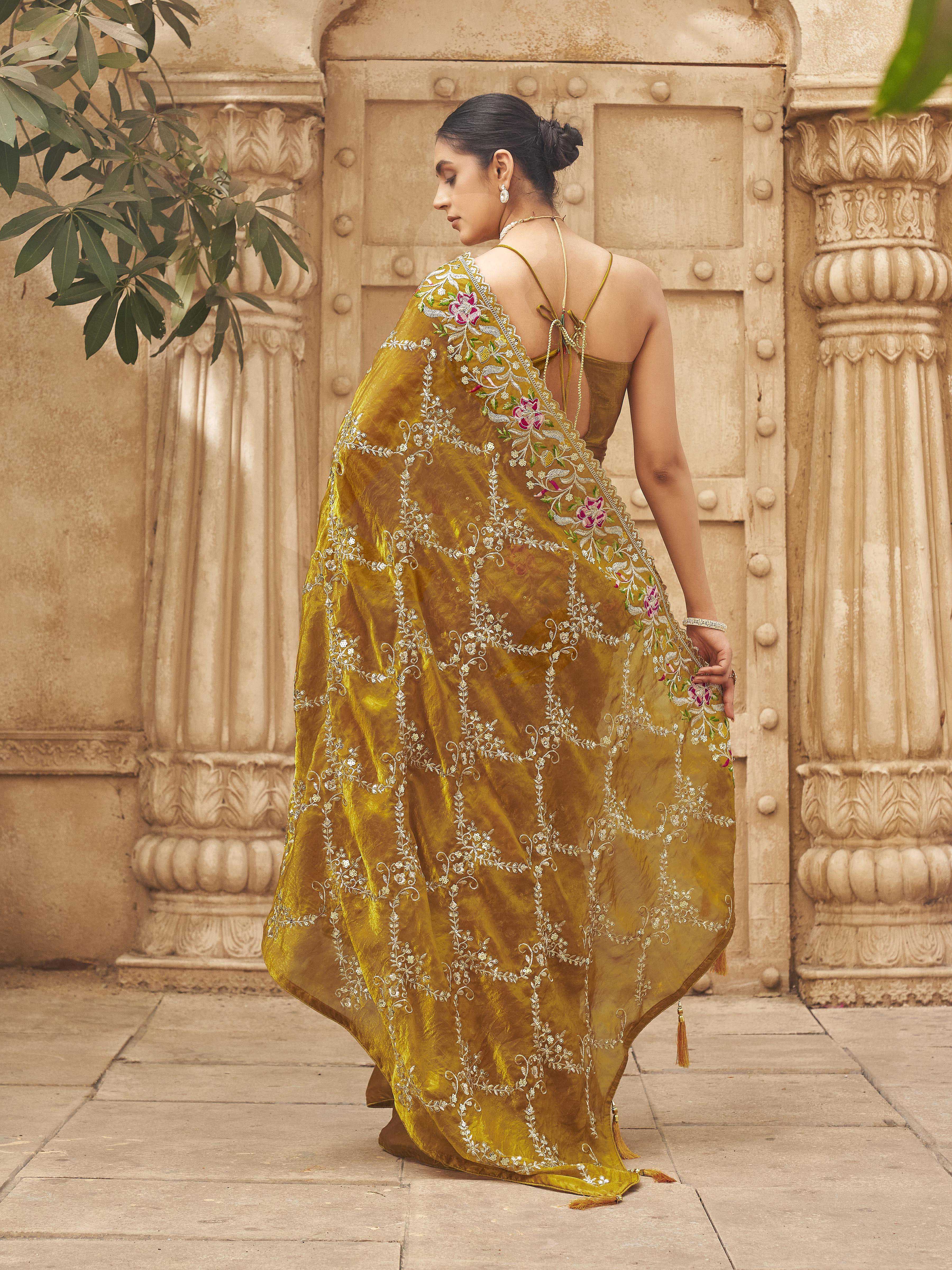 Two tone yellow and gold colored satin designer saree with sequin embroidery on pallu