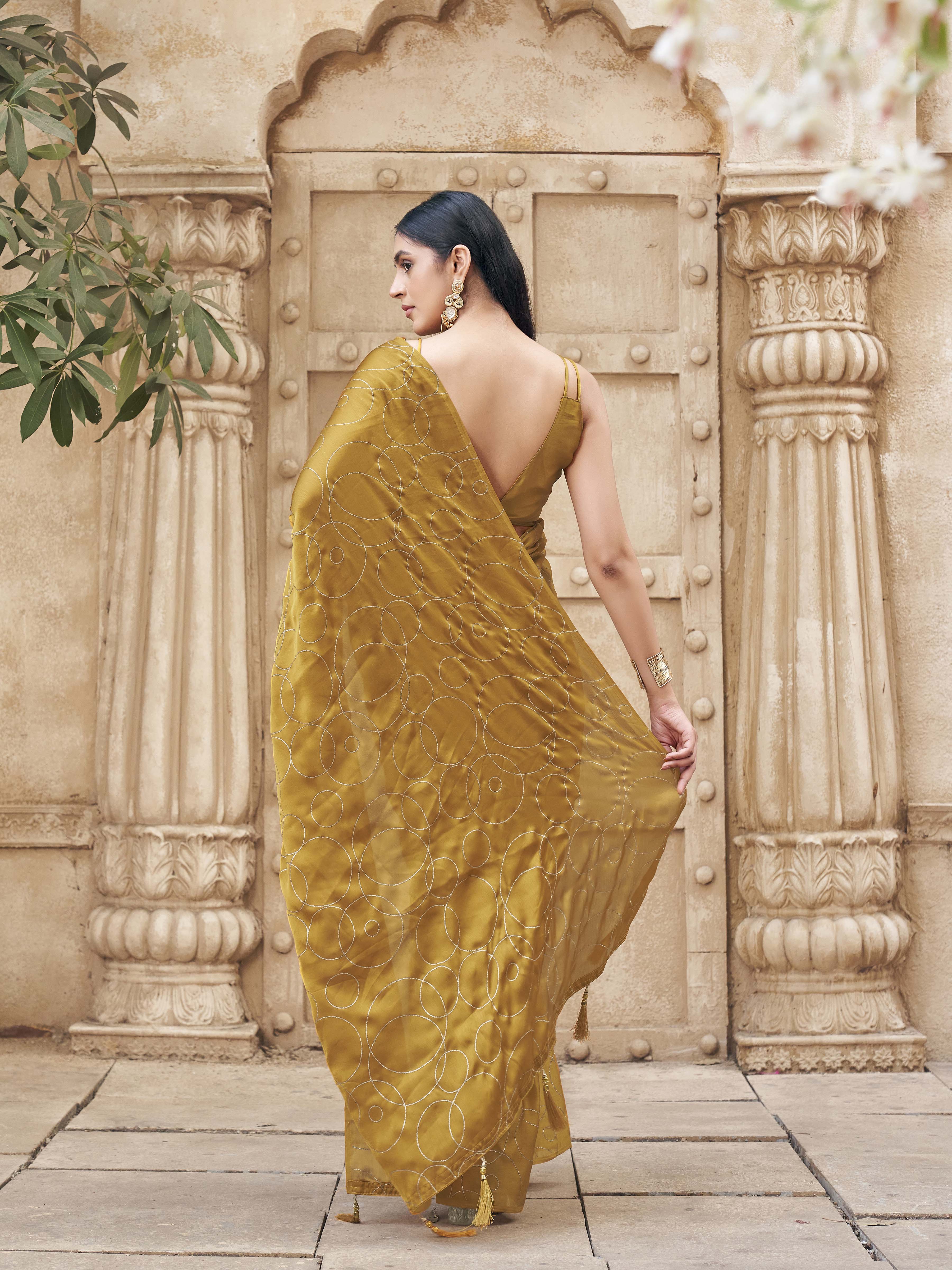 Ready to wear mustard colored satin saree with foil embellishment