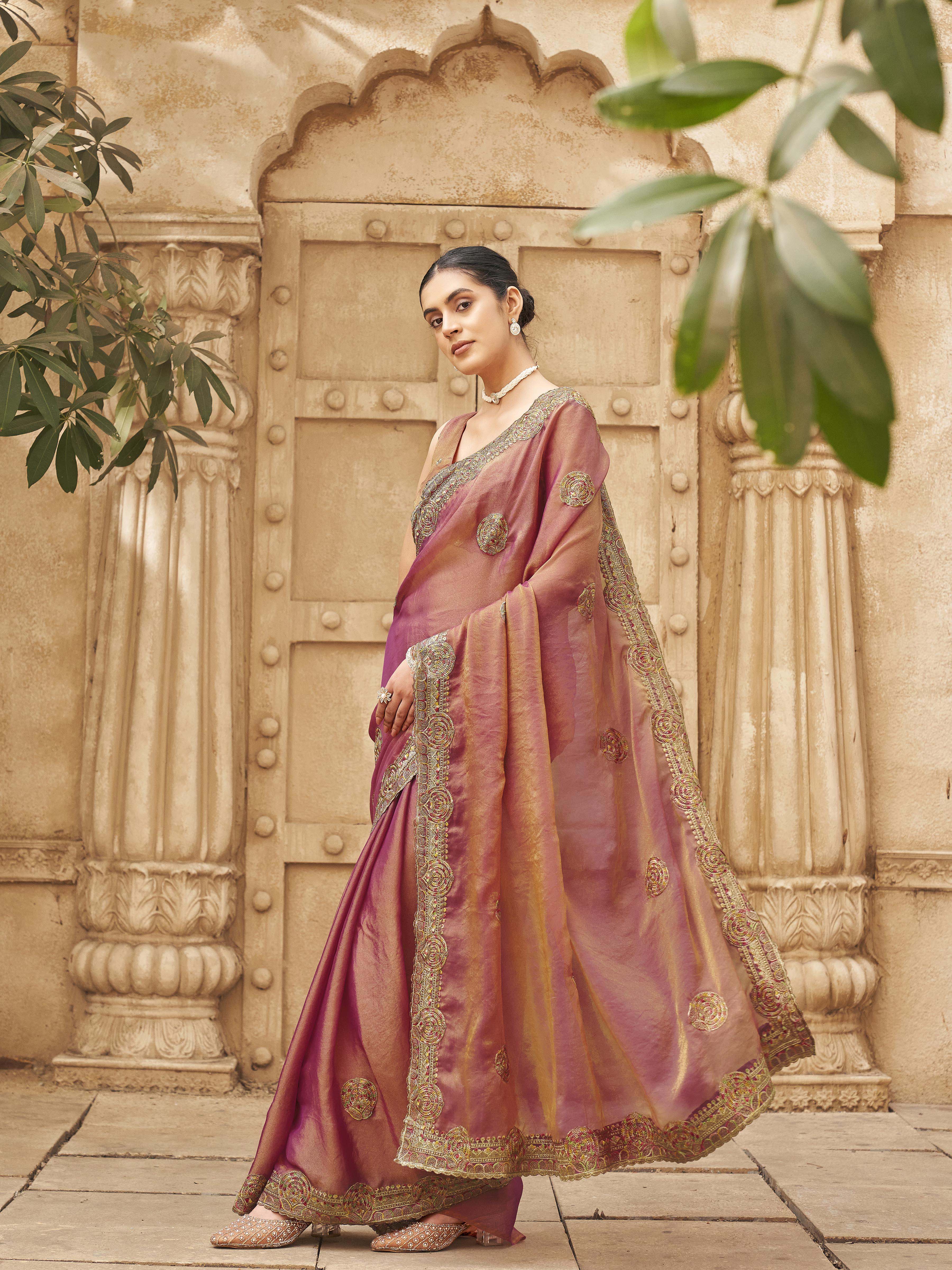 Two tone metallic pink colored embroidered saree
