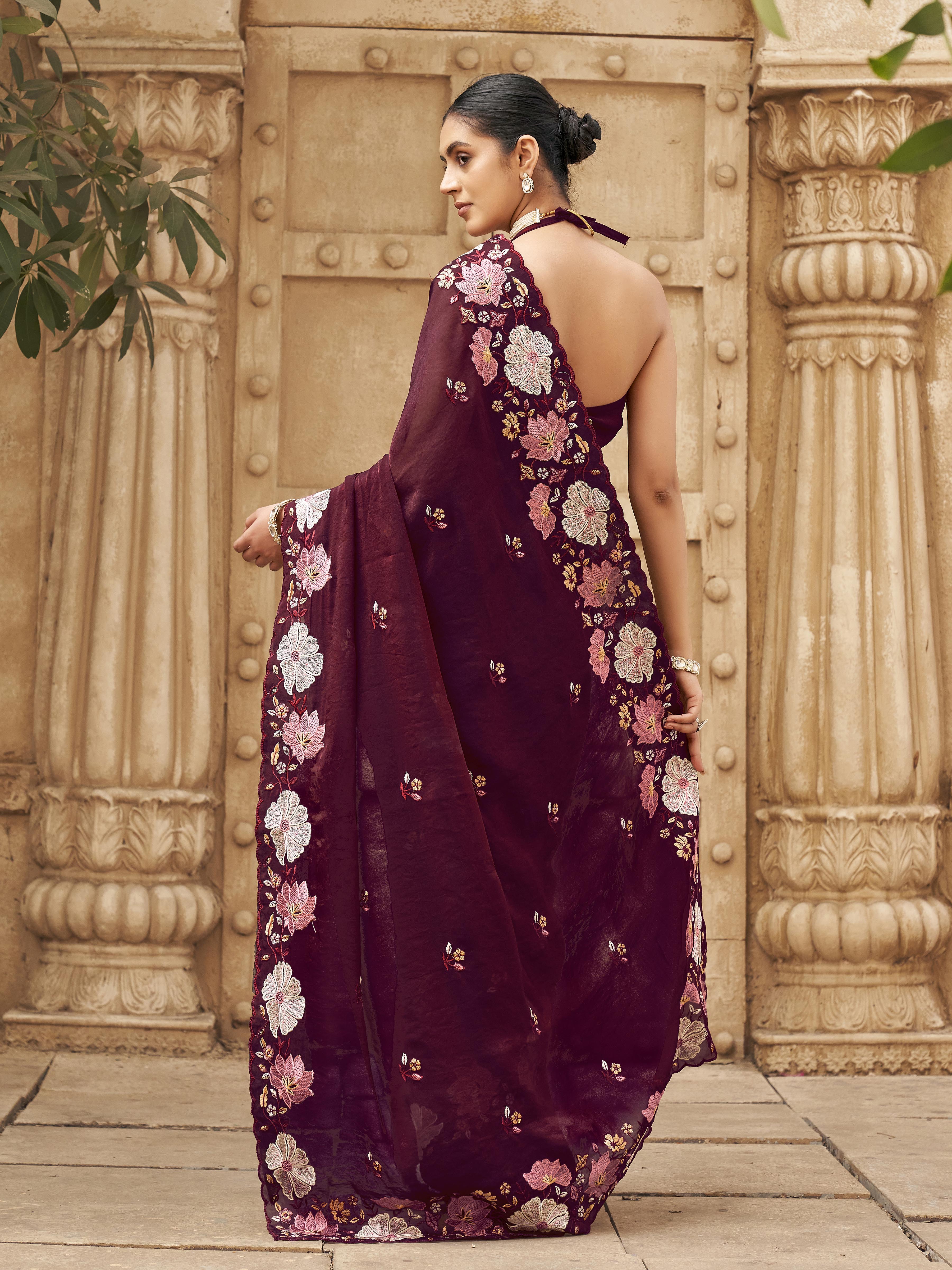 Maroon colored shimmer georgette base designer saree