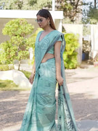 Blue colored muga cotton saree with tassles on pallu