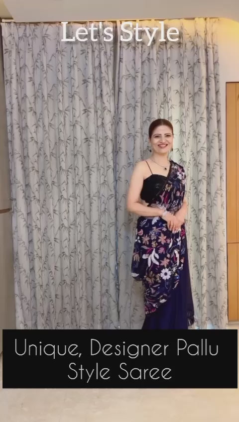 Blue colored designer saree with heavy embroidery on shoulder portion